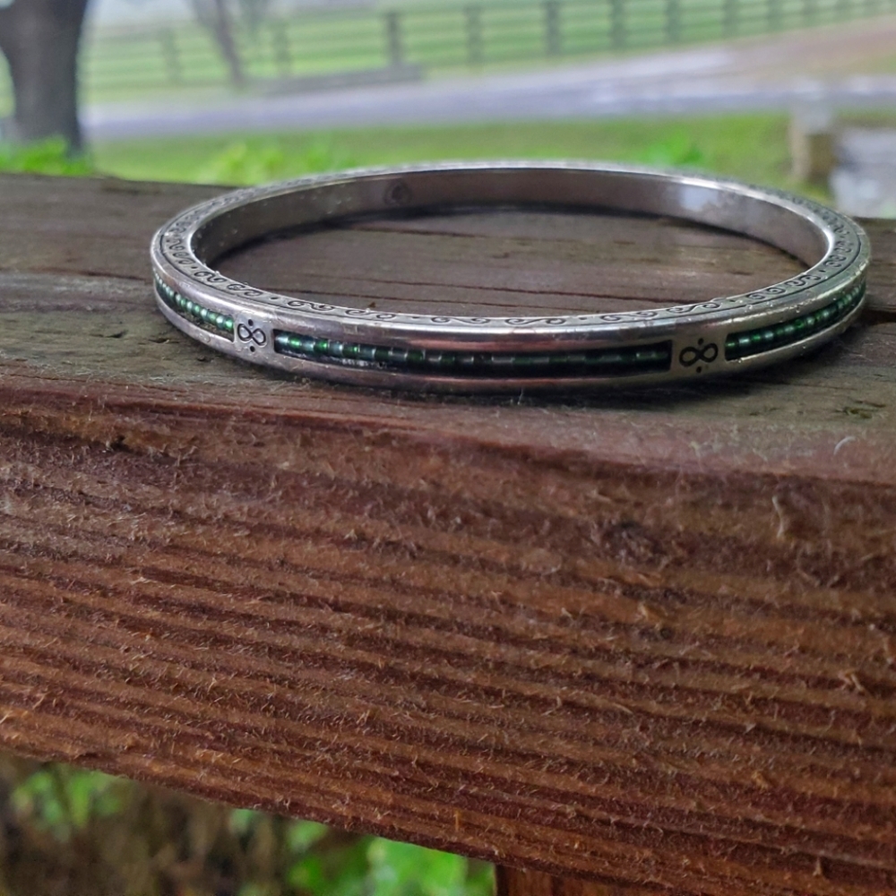 Brighton silver-plated solid bracelet with green stones